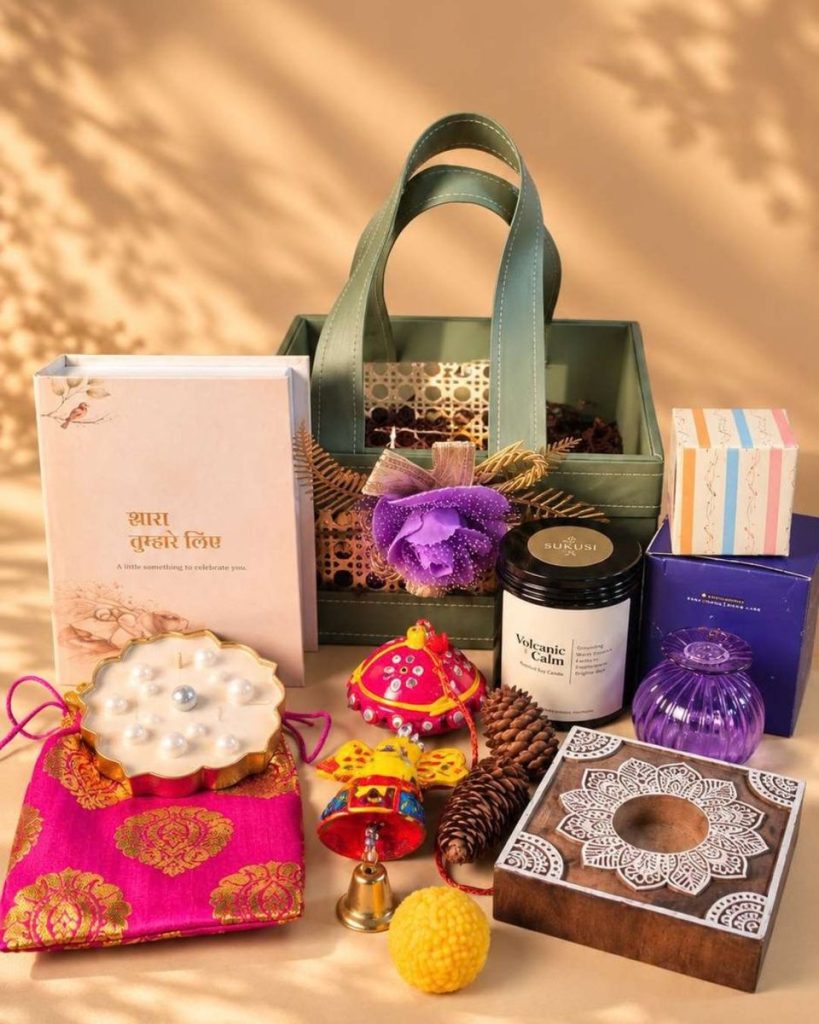 Golden Wishes Diwali Basket – Sukusi gift hamper with candles, diya, hangings and a festive card